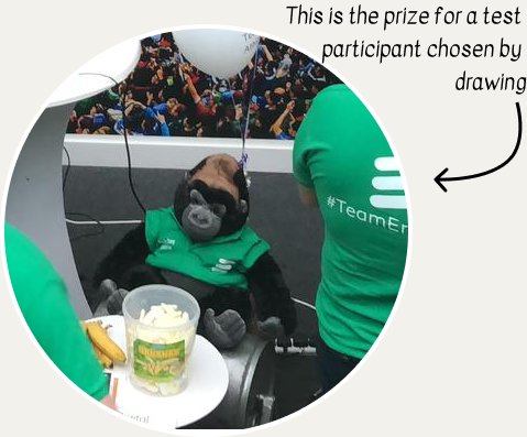 The test station at Tech Day: a large gorilla soft toy in an Ericsson jacket and headphones at the desk, with a banana and a jar of sweets beside it.